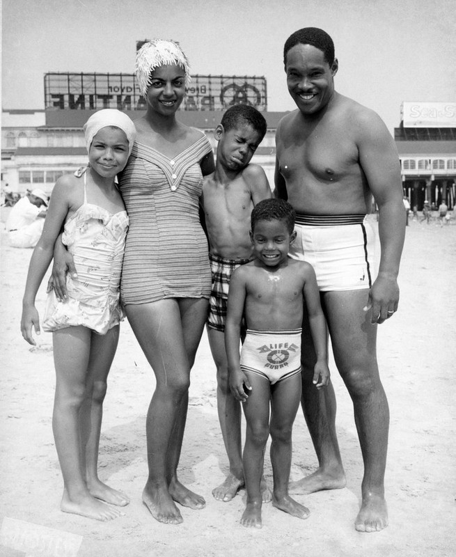 Happy family outing at Chicken Bone Beach, the segregated section of Atlantic City’s beach area, New Jersey, 1950s (photographed by John W. Mosley)