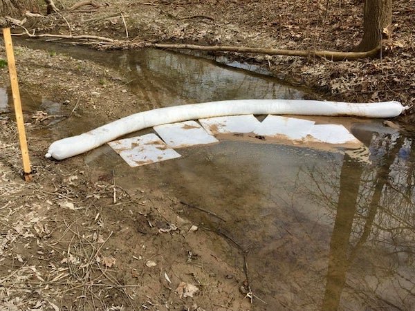 Plastic panels & tubes in a creek near a beaver damn

A: Plastic panels & tubes in a creek near a beaver damn