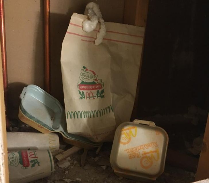 “1977 McDonald’s Christmas trash discovered in the wall of our house.”