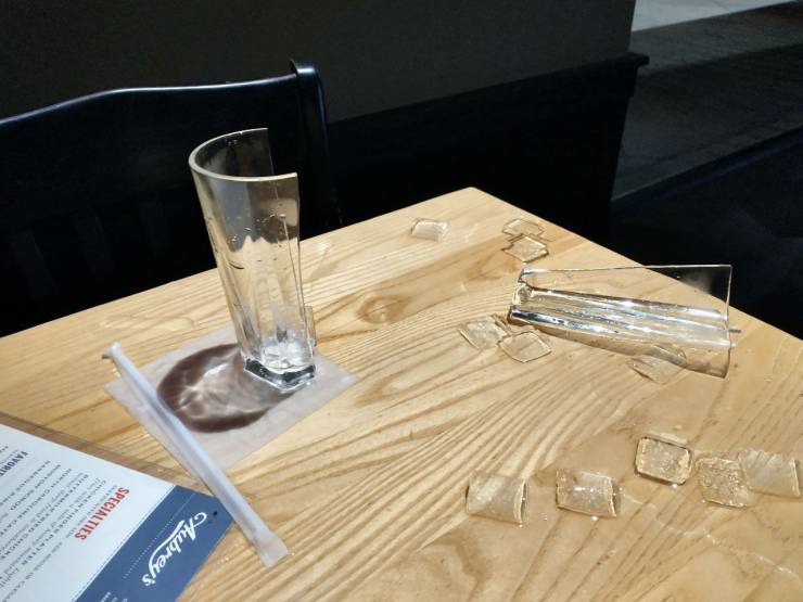 “After my waitress sat down my ice water and walked away, my glass split cleanly in half.”