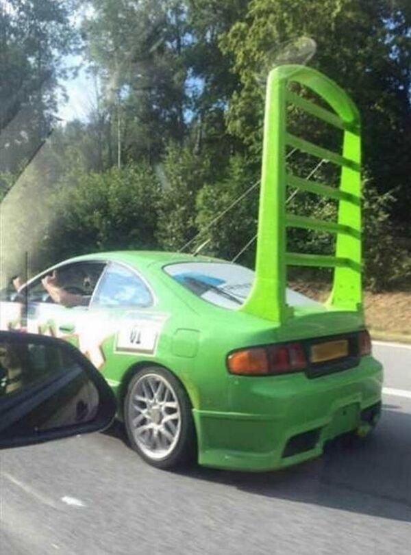 funny fails - green car with way too many spoilers