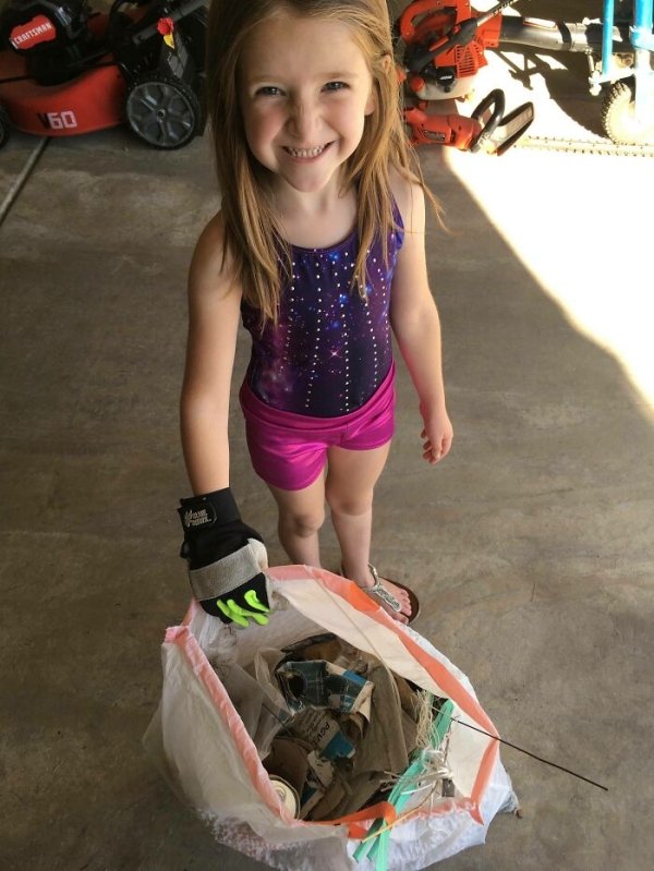 Daughter won’t let us go anywhere without a trash bag, just in case we find garbage that we need to clean up. She picked this up down our street today.