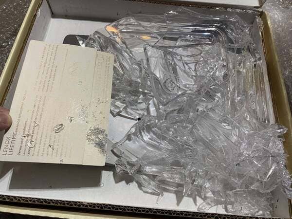 Paid $31 in shipping costs to ship a discontinued crystal picture frame.