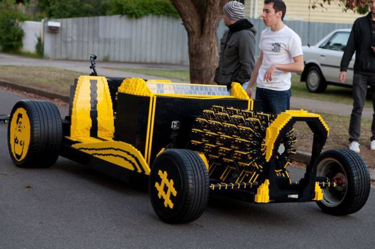 “Two guys made a working car out of lego. The only thing in the whole entire car not made out of lego are the tires. Even the engine is made out of lego and runs on compressed air. Top speed is 20 mph.”