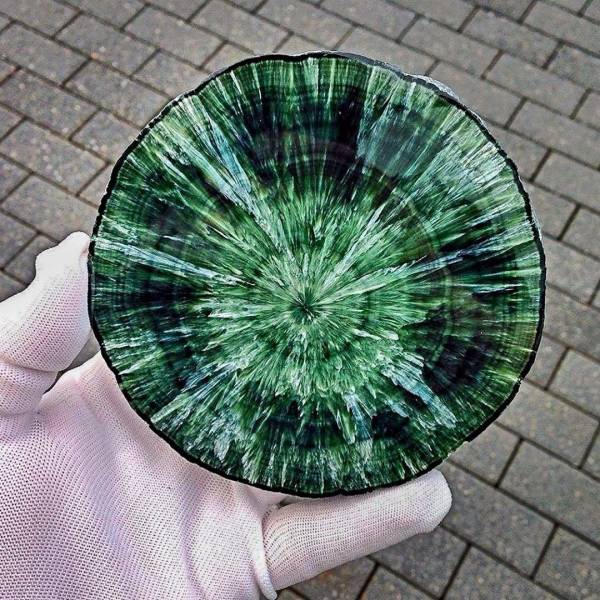 “This Crazy crystal is Seraphinite, a very rare stalactitic Gem found only in the high mountains of eastern Siberia! It is so remote that miners actually have to watch out for prowling Siberian tigers!”