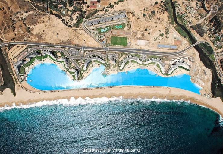 “The longest swimming pool in the word. Situated in San Alfonso del Mar, Chile. The pool is more than a kilometre longer and it's 77000m².”