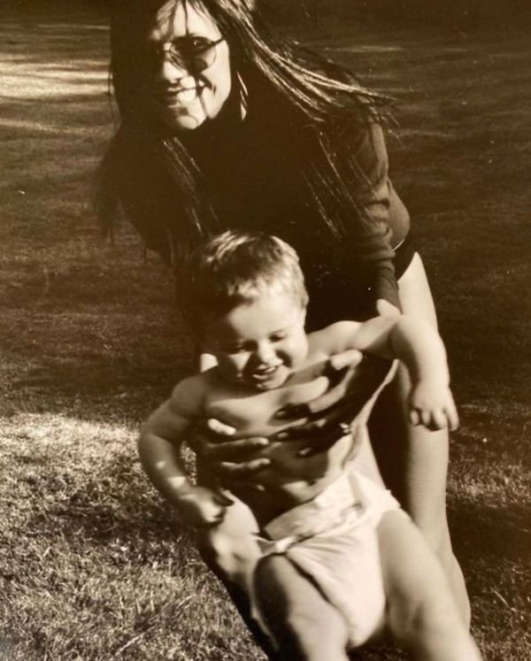 Brooklyn Beckham with mom Victoria Beckham in the early 2000s