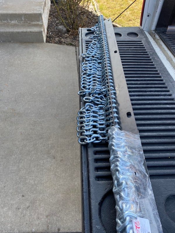 I found this angle bar with chains attached. It’s about 6 feet long. Does anyone know what this is used for?

A: Looks like a brush cutter chain guard. These hang down off a brush cutter or “bush-hog” type of attachment to stop bricks stones and large tree debris flying out and causing injury. The holes in the angle iron would allow the length to be bolted to the machinery.