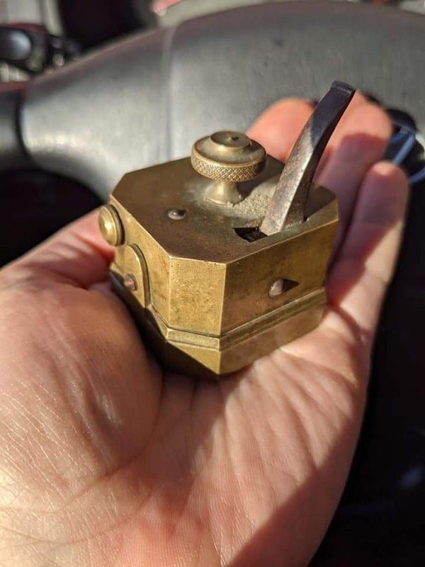 This is about 3 in by 3 in with a little movable lever and these little fins come out of the bottom when it is engaged. What is this thing?

A: It’s a bloodletting device.