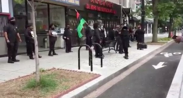 Group of racists upset with the Chinese government protest in front of two Chinese American restaurants that have no connection to the Chinese government