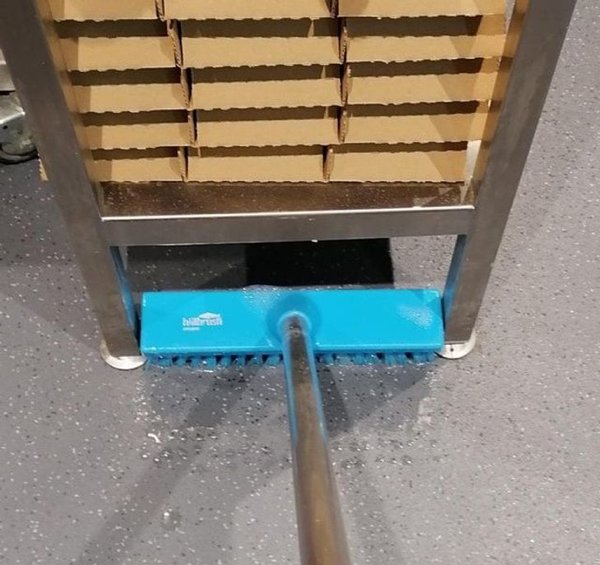 “Discovered new scrubbing brush fits perfectly under these shelves at work.”