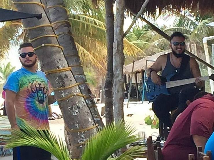 “My brother (left) saw his bass player doppelgänger on the beach in Mexico.”