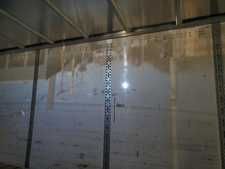 “There was a small hole in the side of a trailer I was loading today, resulting in an image of the street outside being projected upside down on the opposite wall.”