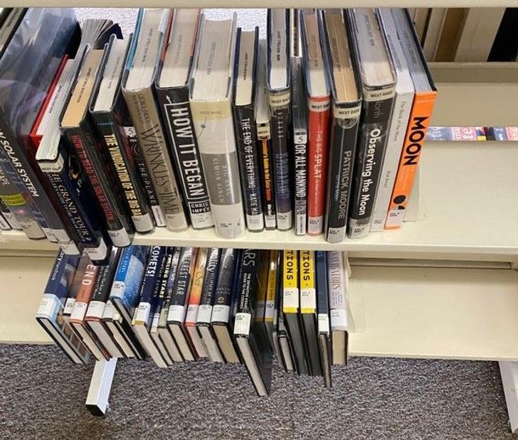 “The books at the bottom are flipped at an angle so you don’t have to bend down to see.”