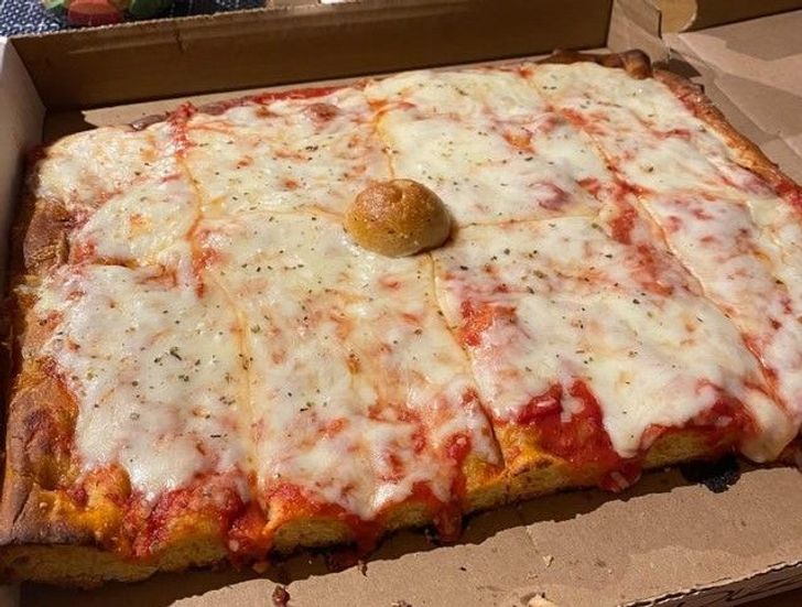 “This local pizza place uses a garlic knot to prevent the cheese from touching the box.”