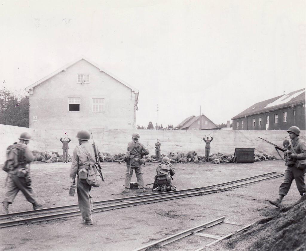Soldiers from the U.S. 45th and 42nd Divisions arrived at Dachau camp, near Munich, on April 29, 1945. Investigators later concluded that vengeful GIs gunned down at least twenty-eight SS guards after they had surrendered