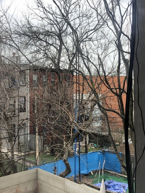 I keep seeing these strange ladders around Brooklyn

A: These were actually community clothes lines. There would be many attached to that running to the nearby apartments.