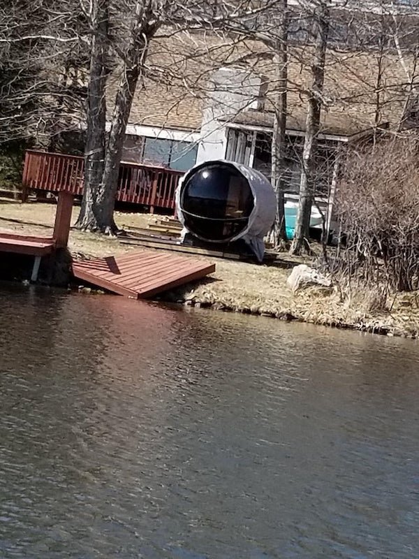 A dome room by someone’s dock in the Poconos? Photo was taken from a canoe…passed this thing in the backyard of someone’s house. Looks like you can get into it maybe? WITT?

A: An outdoor sauna.
