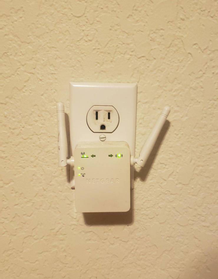 “My wifi extender makes my outlet look like a pissed off robot.”