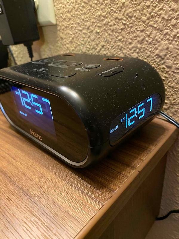 The alarm clock in this hotel has three displays so you can see the time without moving while lying in either of the beds.