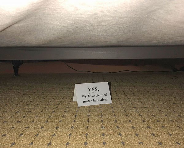 This little sign under the bed in my hotel room that lets you know they’ve cleaned under there too.