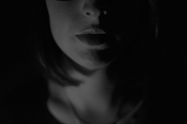 woman face dark shadow