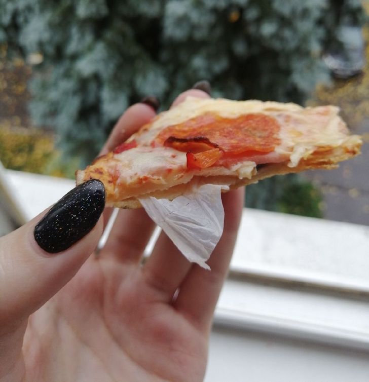 “I ordered a pizza with thick crust, and it had plastic inside. My review was deleted from their group, so I wrote to the manager and attached this photo.”