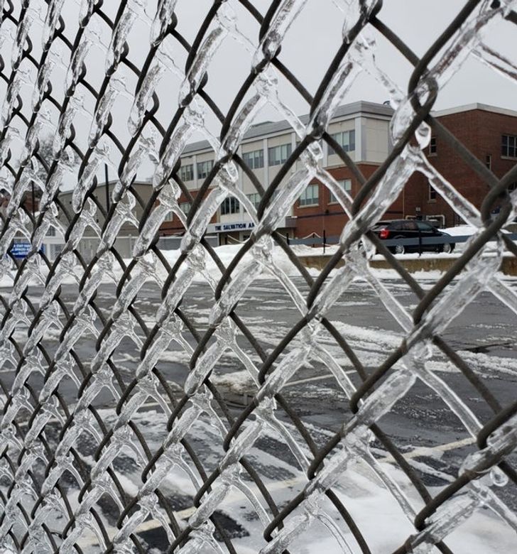 Ice formed the exact same pattern, creating a double fence.