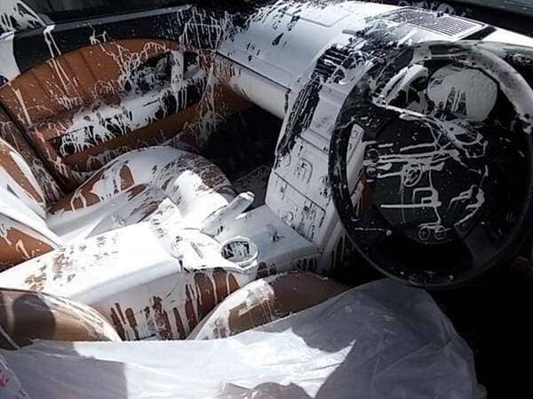 Pro-tip: When transporting paint make sure it is properly secured. Especially if you are driving in a $90,000 Maserati.