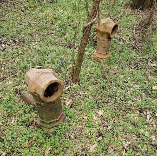 “They’re about 2 feet in height, holes go through and to the base, made of clay I think.”
The answer: "Looks like a chimney pot (top of chimney). Probably removed when demolishing a house or upgrading the fireplace. If they’re attached to something underground, then they might be on top of a vent."