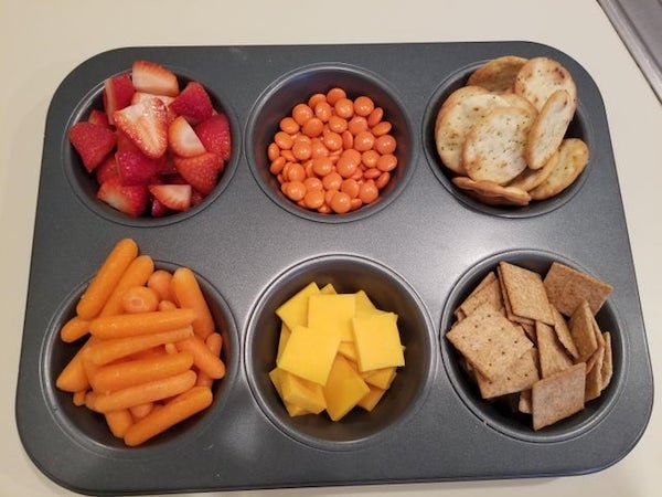 Muffin tin snack tray: organized and no cross-snack contamination