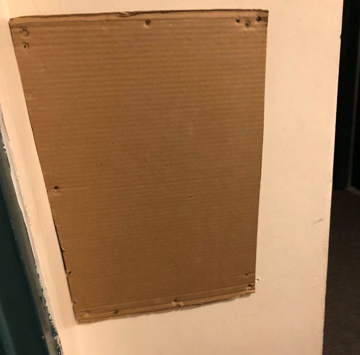 “My landlord screwed a piece of cardboard to the wall.”