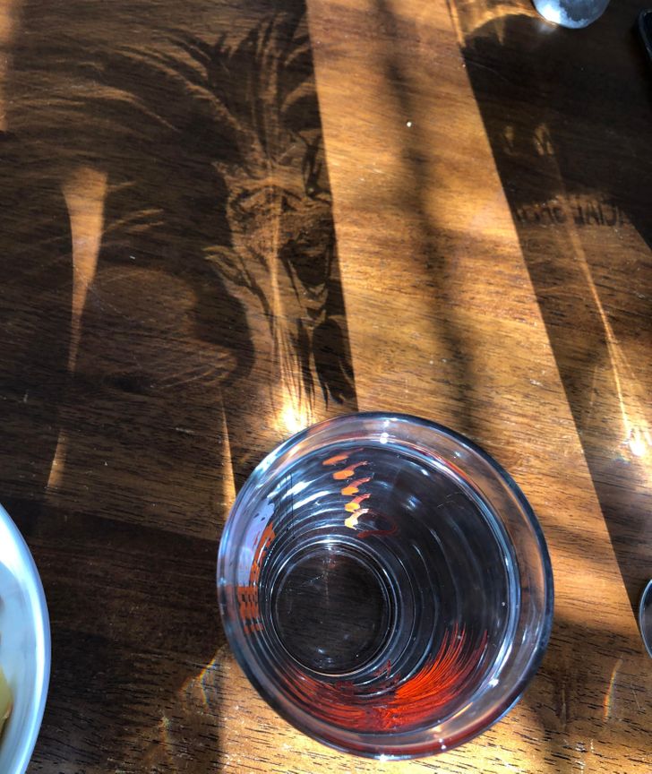 “A shadow from my pint glass”