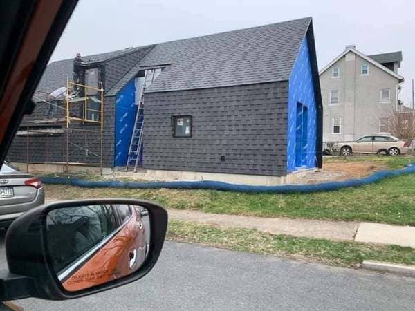 Building a shingle family home.