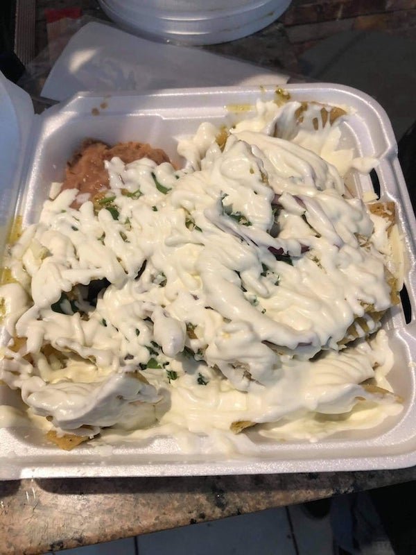 customer asked for extra cream on their chilaquiles…. my co-worker complied (?)