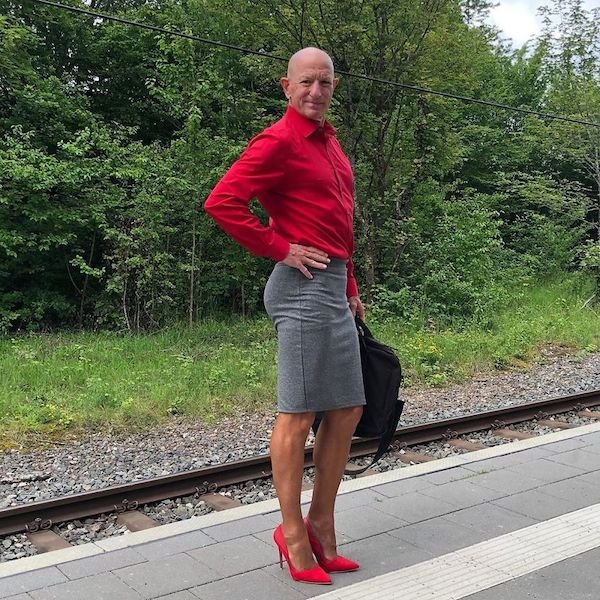 man wears skirts and heels to work