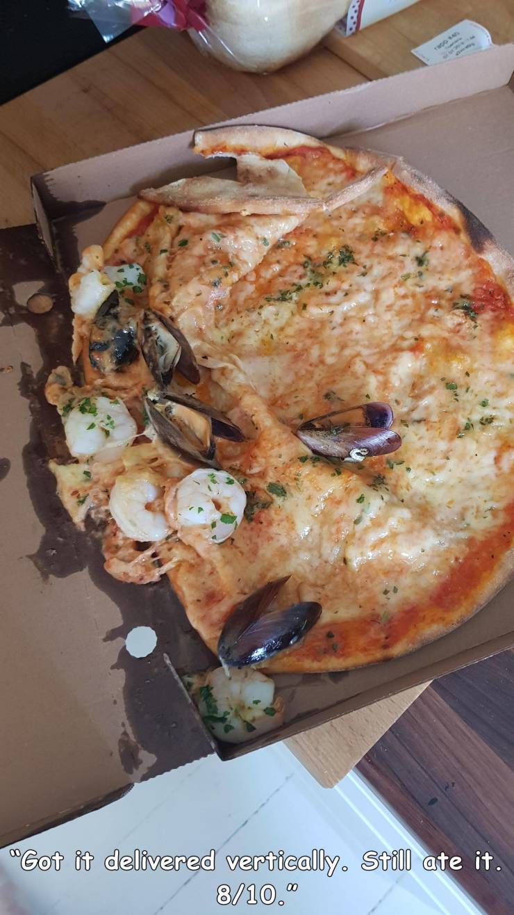 people having a bad day - pizza - "Got it delivered vertically. Still ate it. 810."