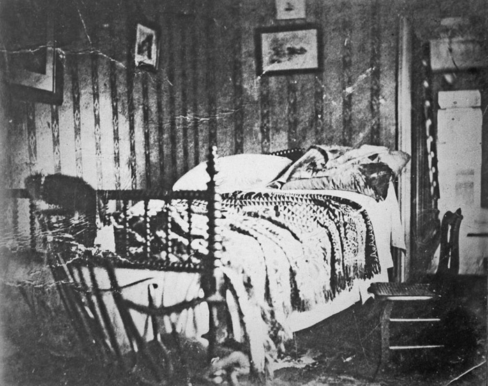 Lincoln’s deathbed at Petersen House, taken shortly after the President’s body was removed, April 1865