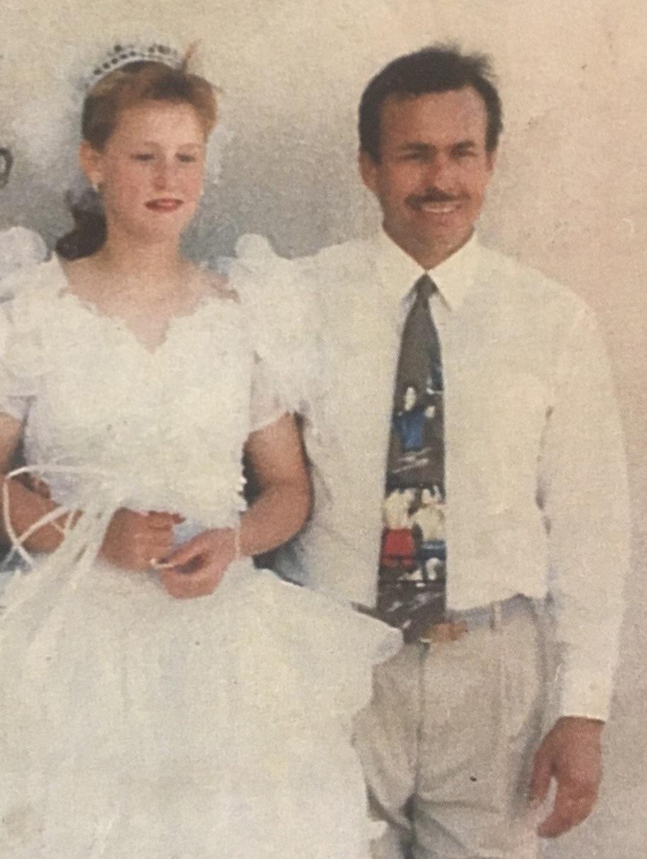 This might look like a normal wedding photo, but it is in fact Rosalyn McGinnis and Henri Piette. He kidnapped her at age 12, abused her in every way possible and staged a mock wedding with her (pictured) He held her hostage for 19 years and forced her to have 9 children with him.