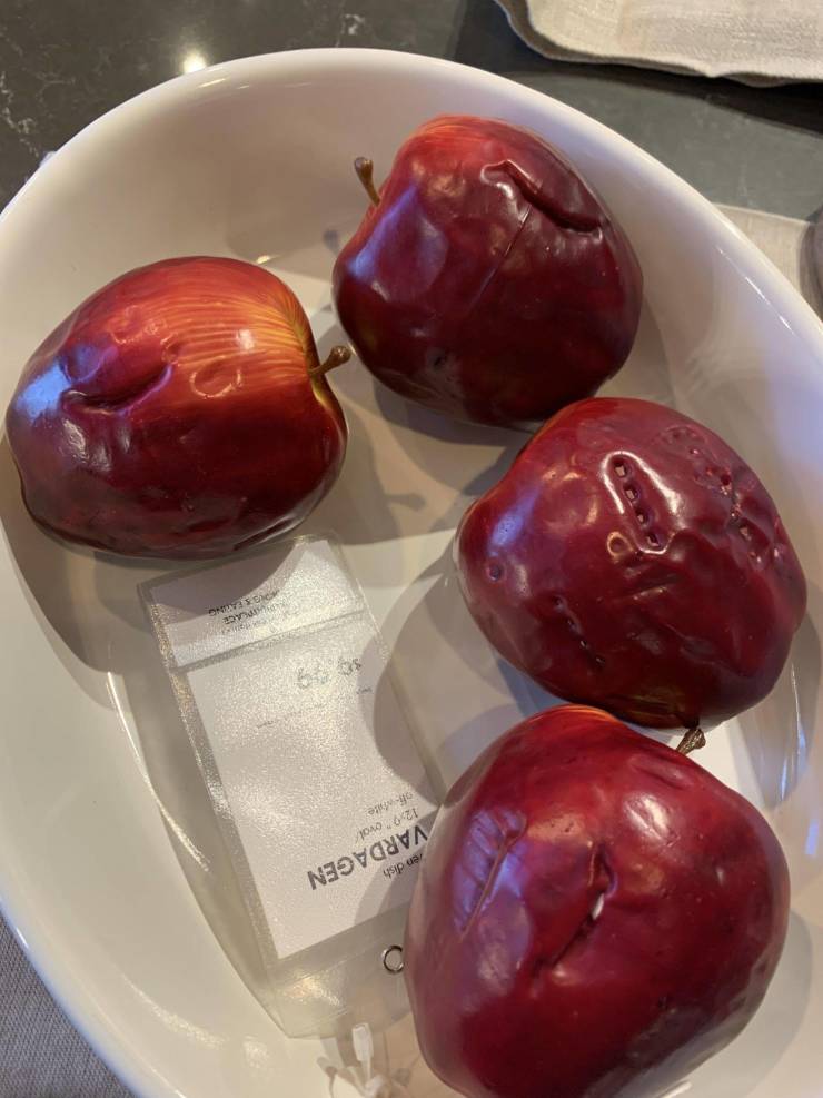 “The surprising amount of bite marks on these IKEA display apples.”