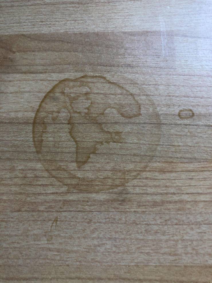 “Coffee stain that looks like Earth.”