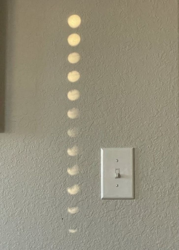 “My blinds’ reflection looks like lunar phases on my wall.”