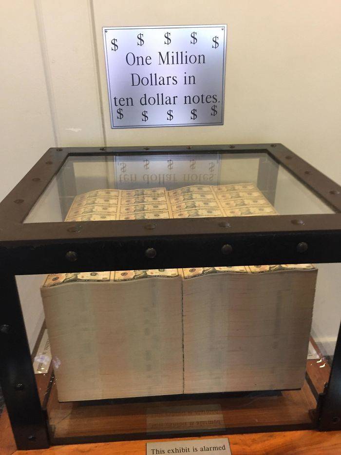 mildly interesting - $ One Million Dollars in ten dollar notes. 1$ $ $ $ $ 2 Eu Conseil Dolcz Ce Cer This exhibit is alarmed