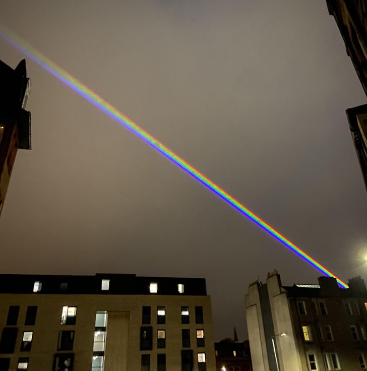 “Rainbow laser beam over Edinburgh, Scotland back in March”