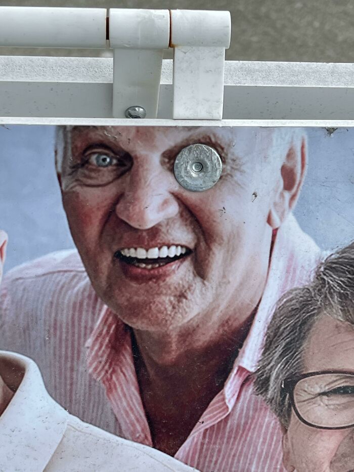 Sandwich Board Advertising Seniors Day - Unfortunate Fastener Placement