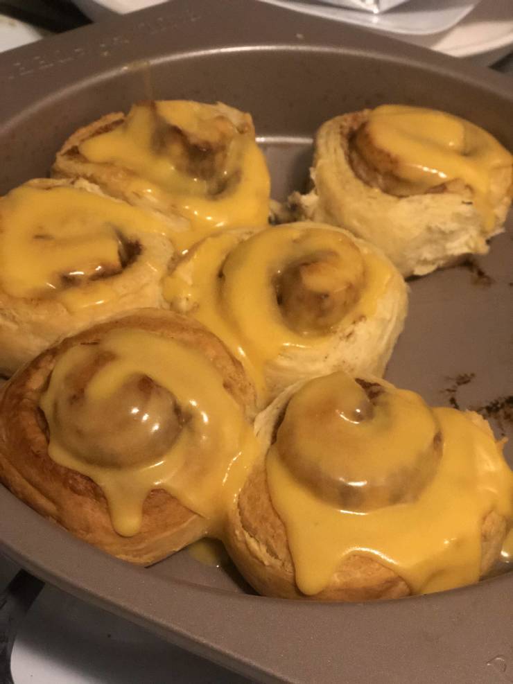 "My Husband wanted a sweet treat. I made orange rolls. To keep it interesting, one of these has nacho cheese on it."