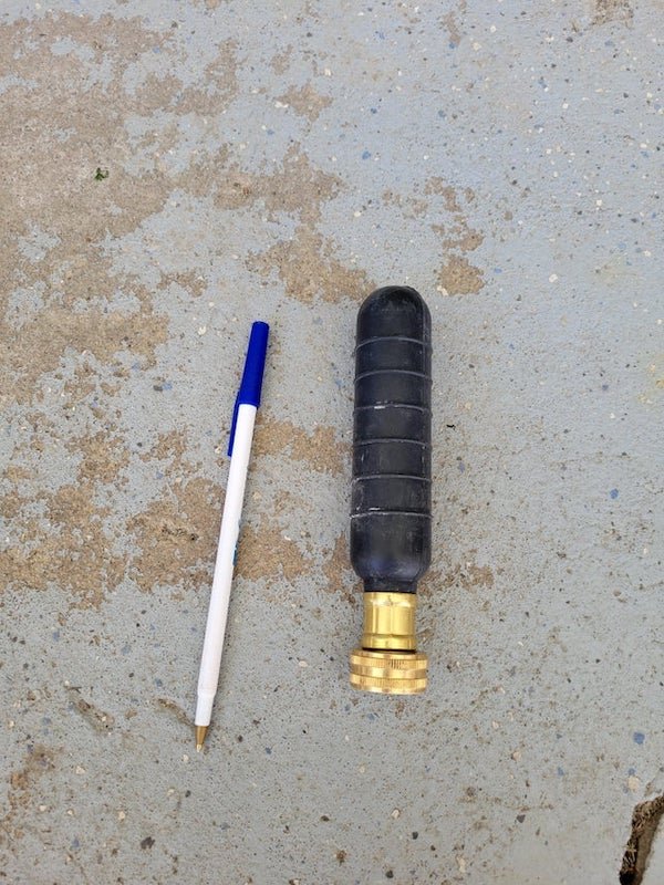 Flexible rubber thing with a garden hose-sized connection on one end.A: It’s for clearing clogged drains. It works just like you think it does. Put it in a pipe between 1.5” and 3” and it will first expand and then start spraying water to clear the clog.