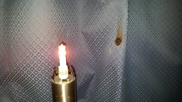 About three weeks ago my sister knocked my lamp over and broke its glass cover. Today I saw that she had placed it next to my curtain, burning a hole in it and almost starting a fire.