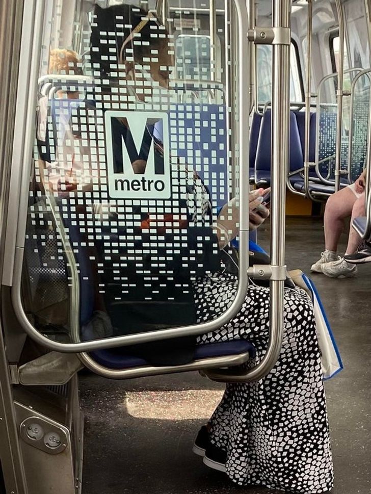 “This woman’s dress matches the metro design.”