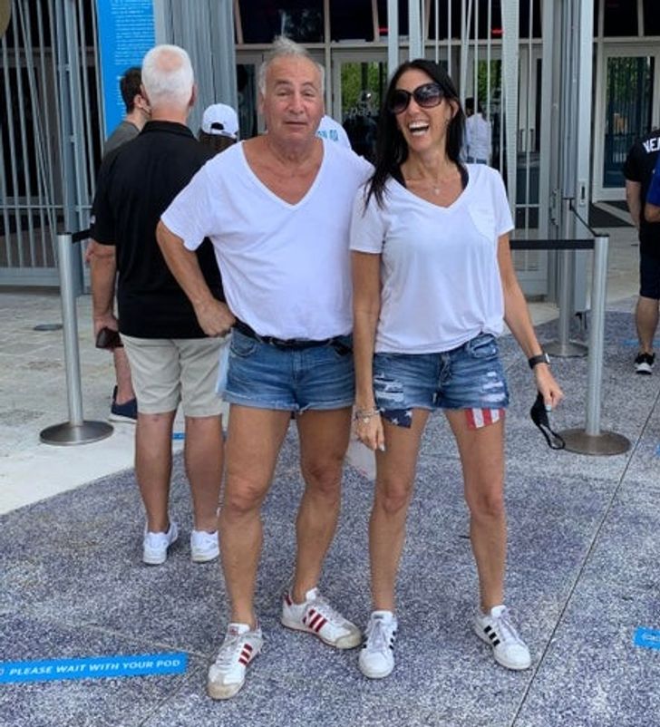 “Told my girlfriend (on the right) to wear shorts and a T-shirt to the Mets/Marlins game — then we ran into this guy.”